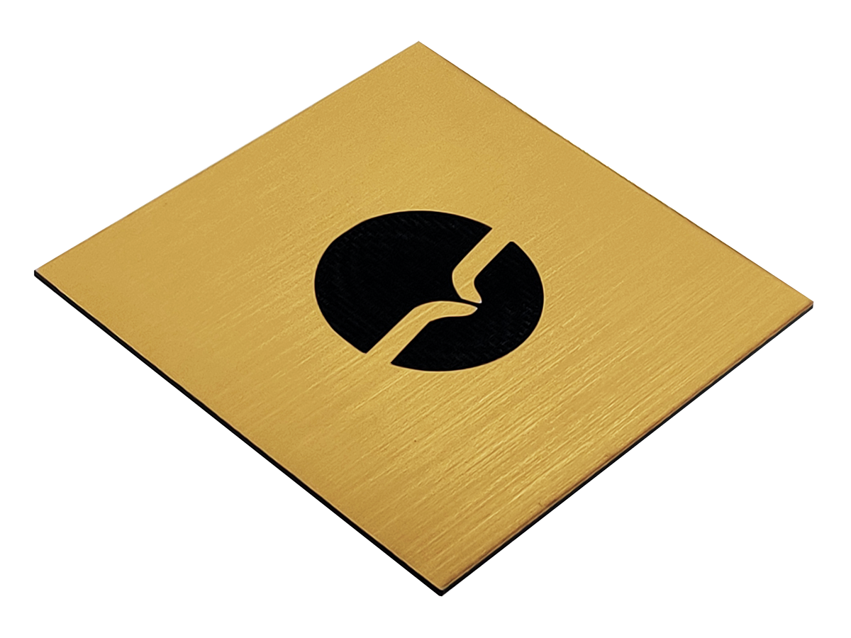 Gravyrplast Borstad Guld/Svart 1200x600x1,6 mm